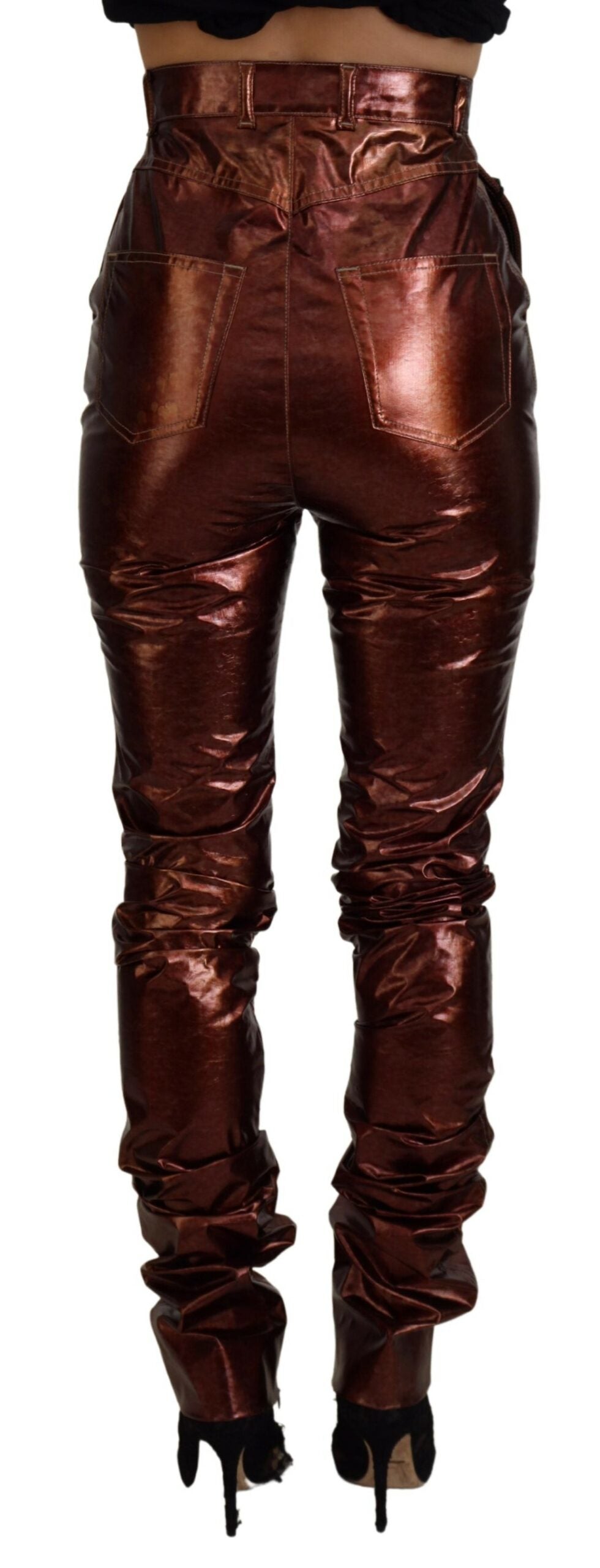 Metallic bronze high waist skinny jeans by Dolce & Gabbana, close-up of fitted denim with shiny finish and detailed stitching.
