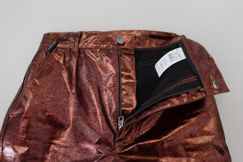 Metallic bronze high waist skinny jeans by Dolce & Gabbana, shown with a close-up of the shiny, form-fitting denim fabric.
