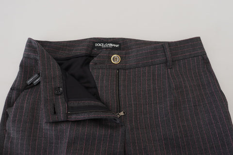 Gray striped wool tapered women's pants by Dolce & Gabbana, showing the fitted waist and tapered leg design.