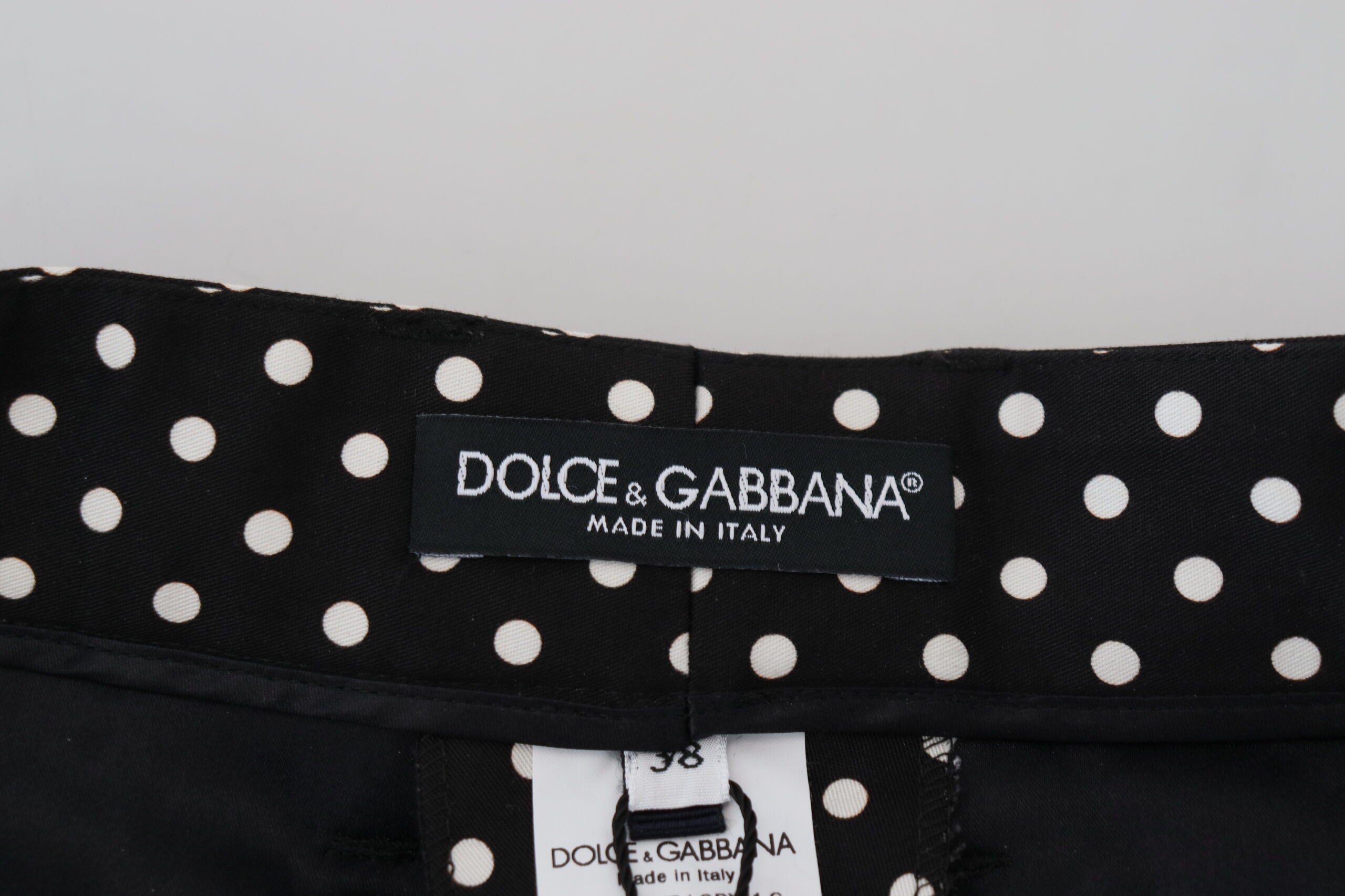 Multicolor polka dot high-waist pants by Dolce & Gabbana, featuring a stylish fit and vibrant pattern.