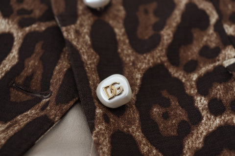 Brown leopard print wool A-line mini skirt by Dolce & Gabbana, featuring a stylish, fitted design and classic animal pattern.