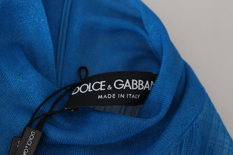 Blue mesh turtleneck long sleeve blouse top by Dolce & Gabbana, featuring a fitted design and sheer fabric.