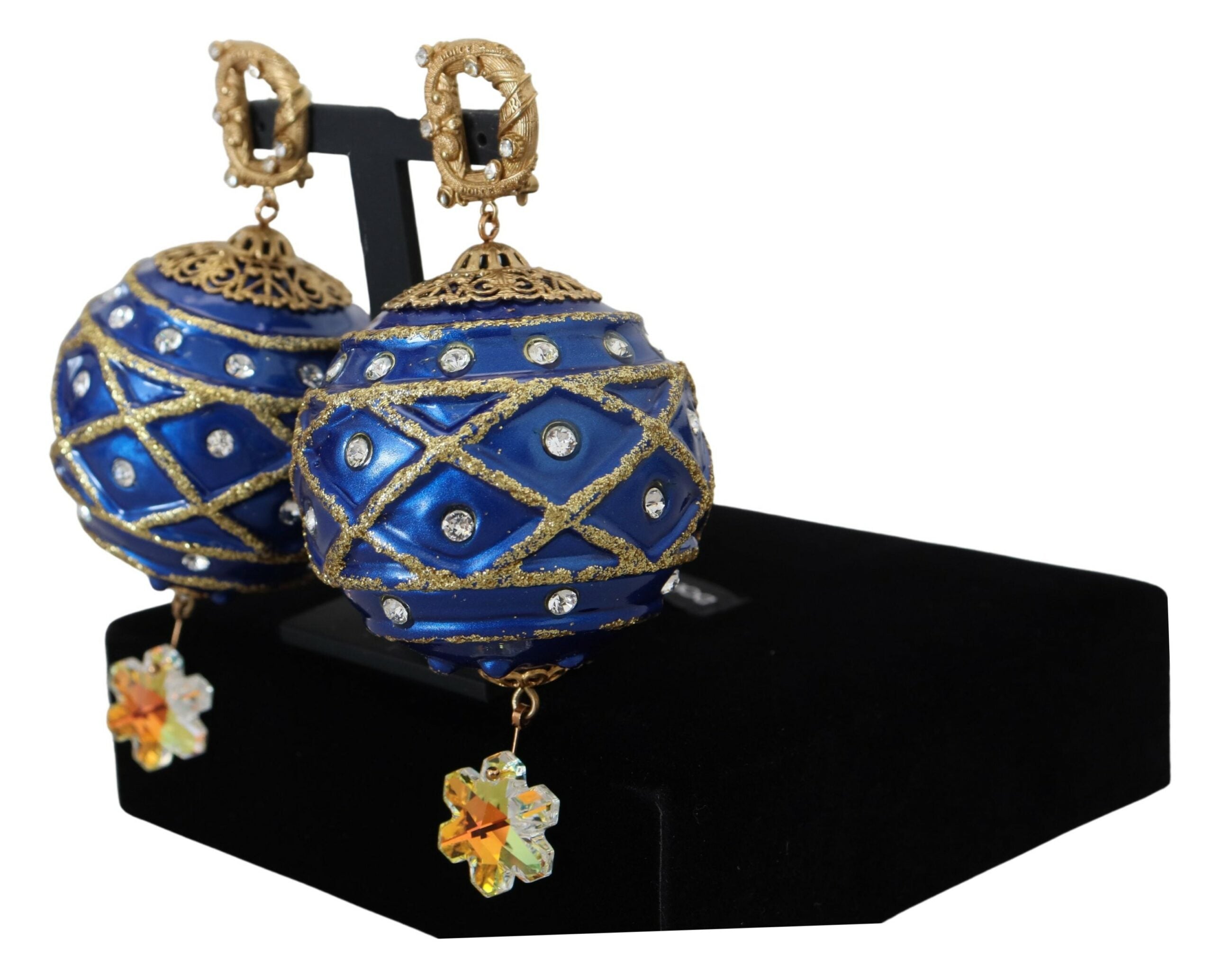Gold brass and blue dangle ball crystal clip-on earrings by Dolce & Gabbana showing intricate design and sparkling crystal accents.