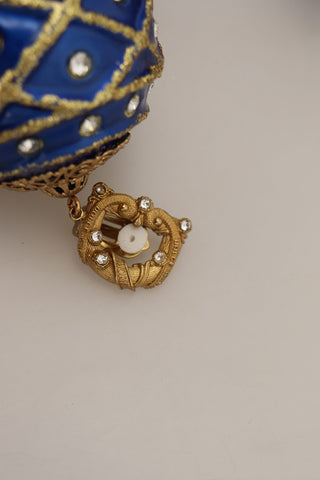Gold brass and blue dangle ball crystal clip-on earrings by Dolce & Gabbana, featuring elegant dangling design and sparkling crystals.