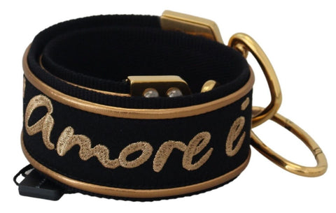 Black and gold logo print brass shoulder strap for bags by Dolce & Gabbana, with adjustable hardware and stylish design.