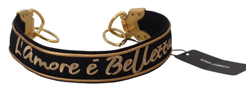 Black brass shoulder strap with gold logo print for Dolce & Gabbana bags, showcasing a stylish accessory with adjustable strap details.