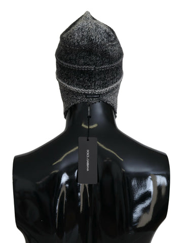 Gray Dolce & Gabbana fleece ear flap knit beanie hat with warm fleece lining and cozy knit design.