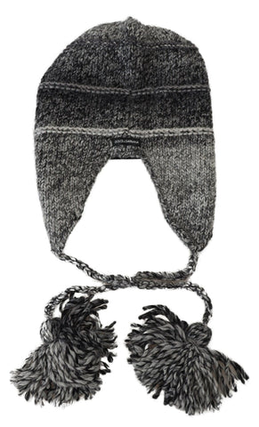 Gray Dolce & Gabbana fleece ear flap knit beanie hat with warm lining and cozy knit design.