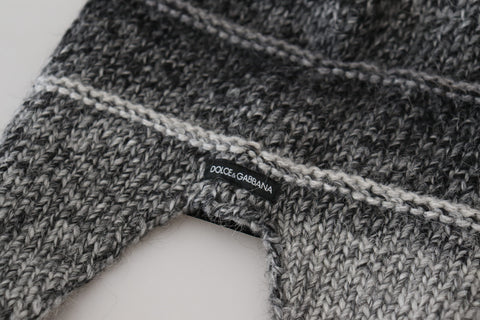 Gray warm fleece ear flap knit beanie hat by Dolce & Gabbana, showing soft fleece lining and cozy ear flaps for winter warmth.