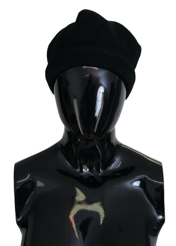 Black virgin wool women’s winter beanie cap hat by Dolce & Gabbana, featuring a cozy, stylish knit design.
