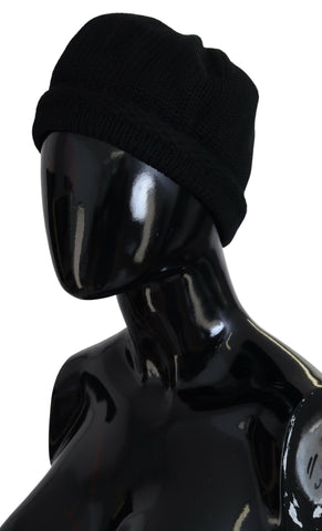 Black Virgin Wool women’s winter beanie cap hat by Dolce & Gabbana, featuring a snug fit and classic knit design.
