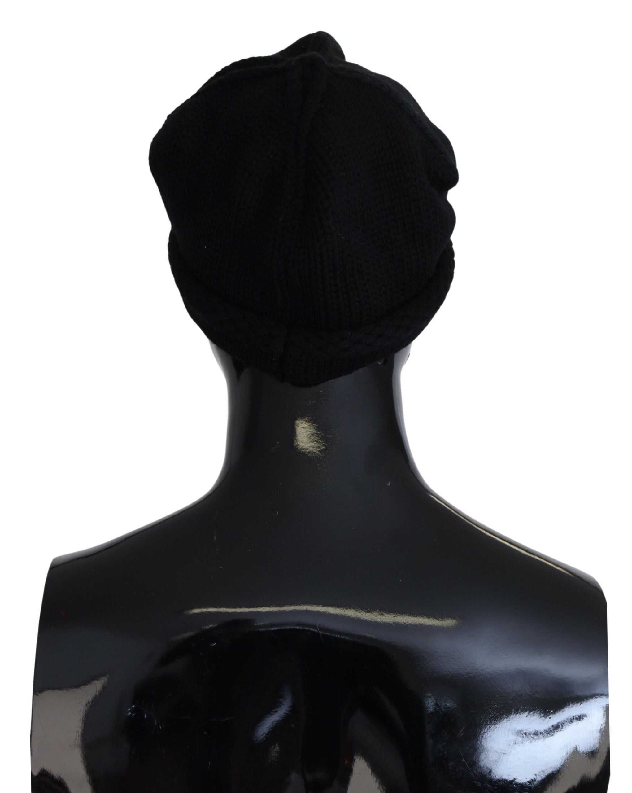 Black Dolce & Gabbana Virgin Wool women's winter beanie hat with a snug fit and knitted texture.