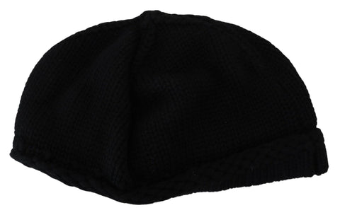 Black Virgin Wool women’s winter beanie cap hat by Dolce & Gabbana, shown on a model, featuring a snug, stylish knit design.