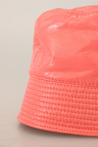 Peach quilted faux leather women’s bucket cap hat by Dolce & Gabbana, featuring stylish quilting and a casual wide brim.