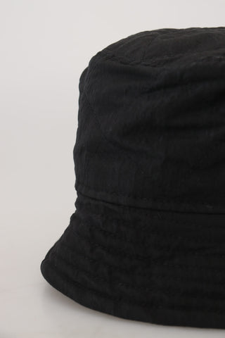 Black nylon women's bucket cap hat by Dolce & Gabbana, featuring a stylish wide-brim design and casual fashion look.
