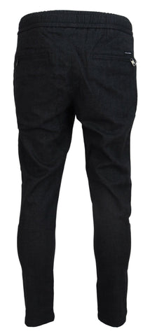 Gray cotton jogger pants for men by Dolce & Gabbana, featuring a relaxed fit and elastic waistband.