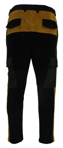 Black and yellow cotton men's pants by Dolce & Gabbana displayed on a hanger.