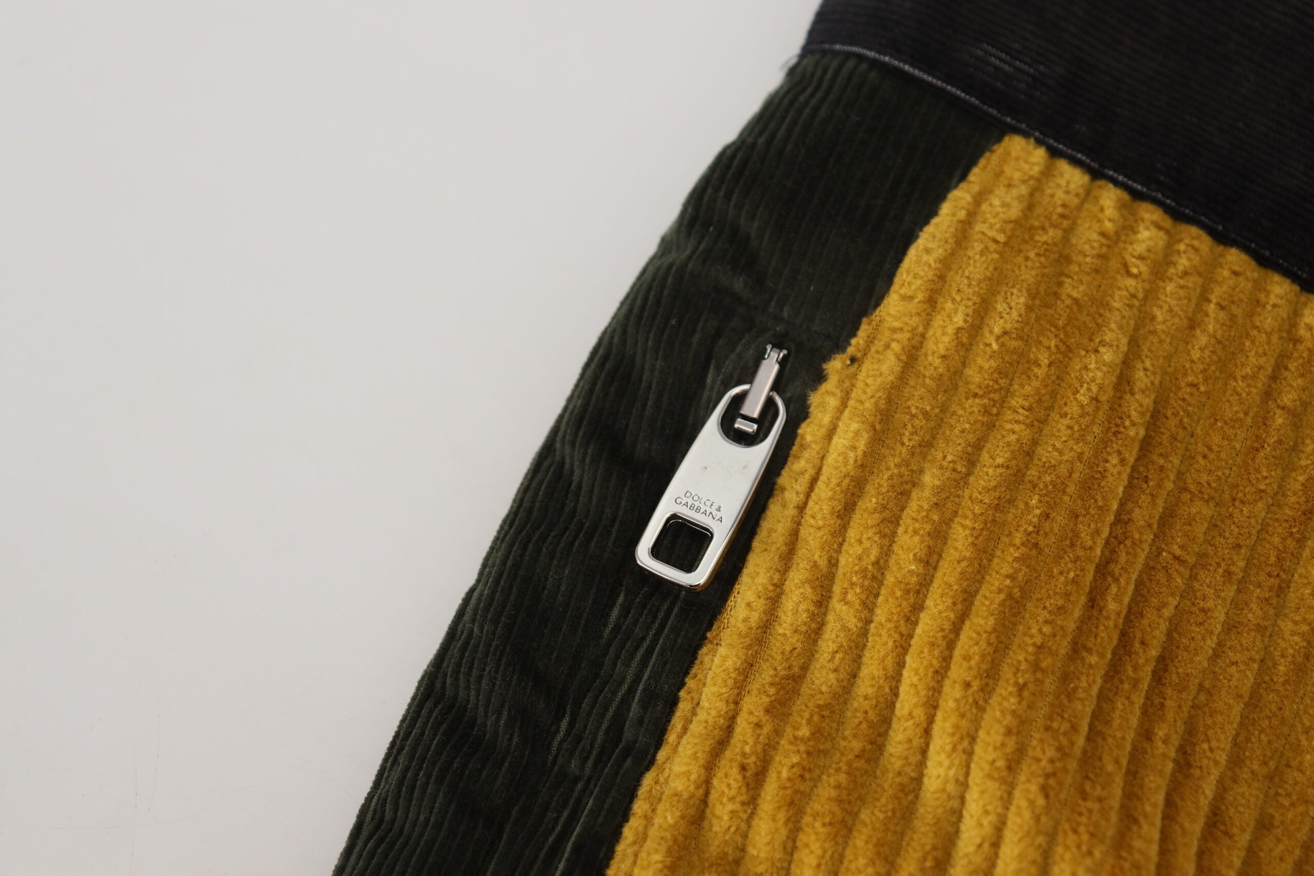 Black and yellow cotton men's pants by Dolce & Gabbana, featuring a stylish design and comfortable fit.