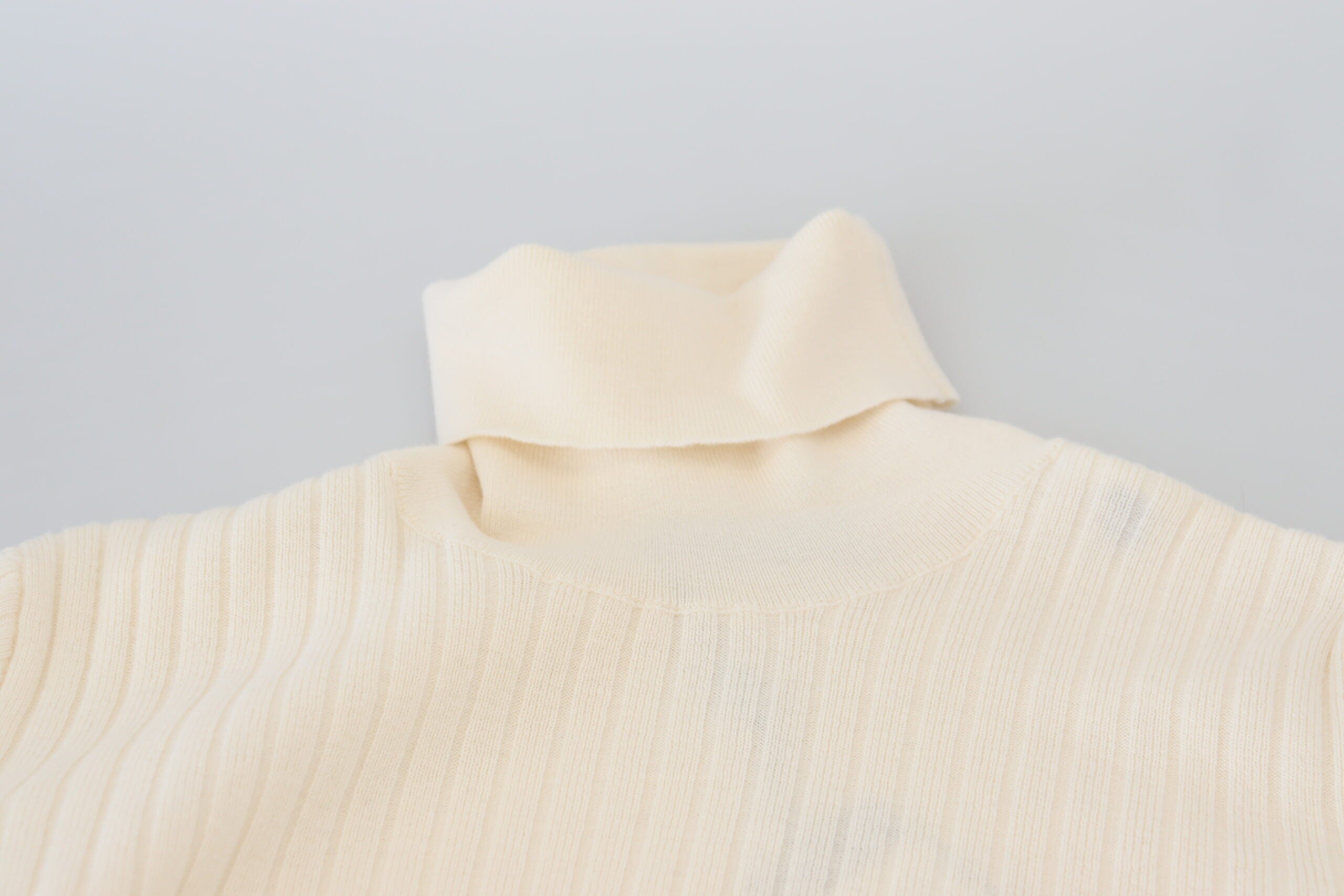 Ivory Dolce & Gabbana turtleneck sweater with distressed cuffs, soft knit pullover, casual and stylish winter clothing.