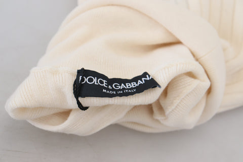 Ivory Dolce & Gabbana turtleneck pullover sweater with distressed cuffs, cozy knit, and stylish design.