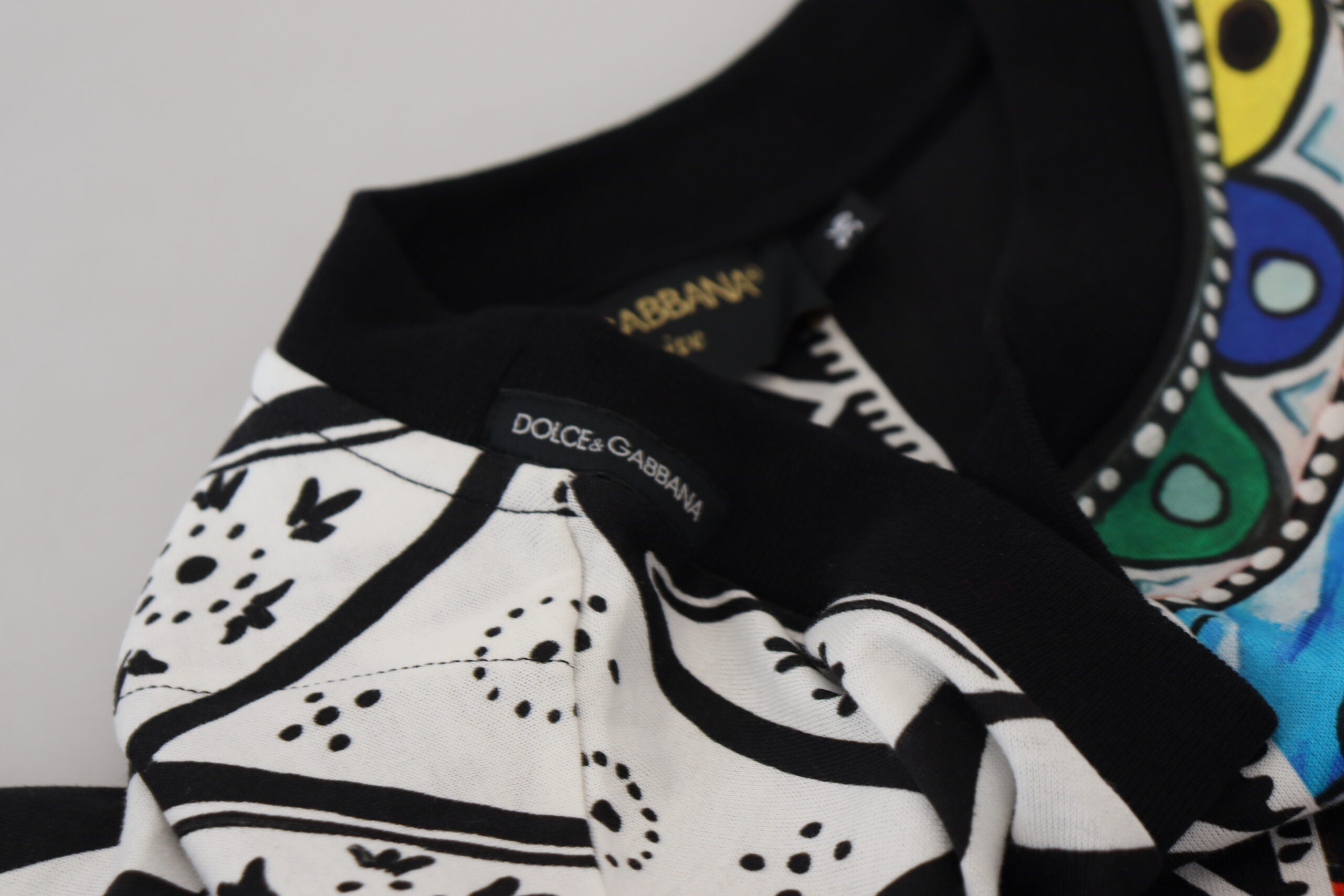 Multicolor printed women's shirt top by Dolce & Gabbana, featuring a vibrant, exclusive design and stylish fit.