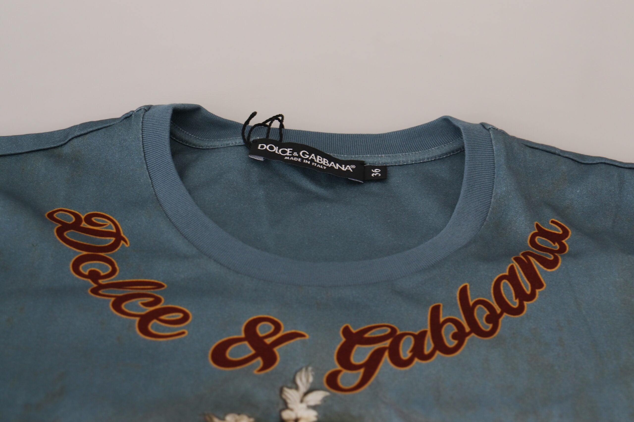 Multicolor DG logo angel printed shirt top by Dolce & Gabbana featuring vibrant graphic design and casual fit.