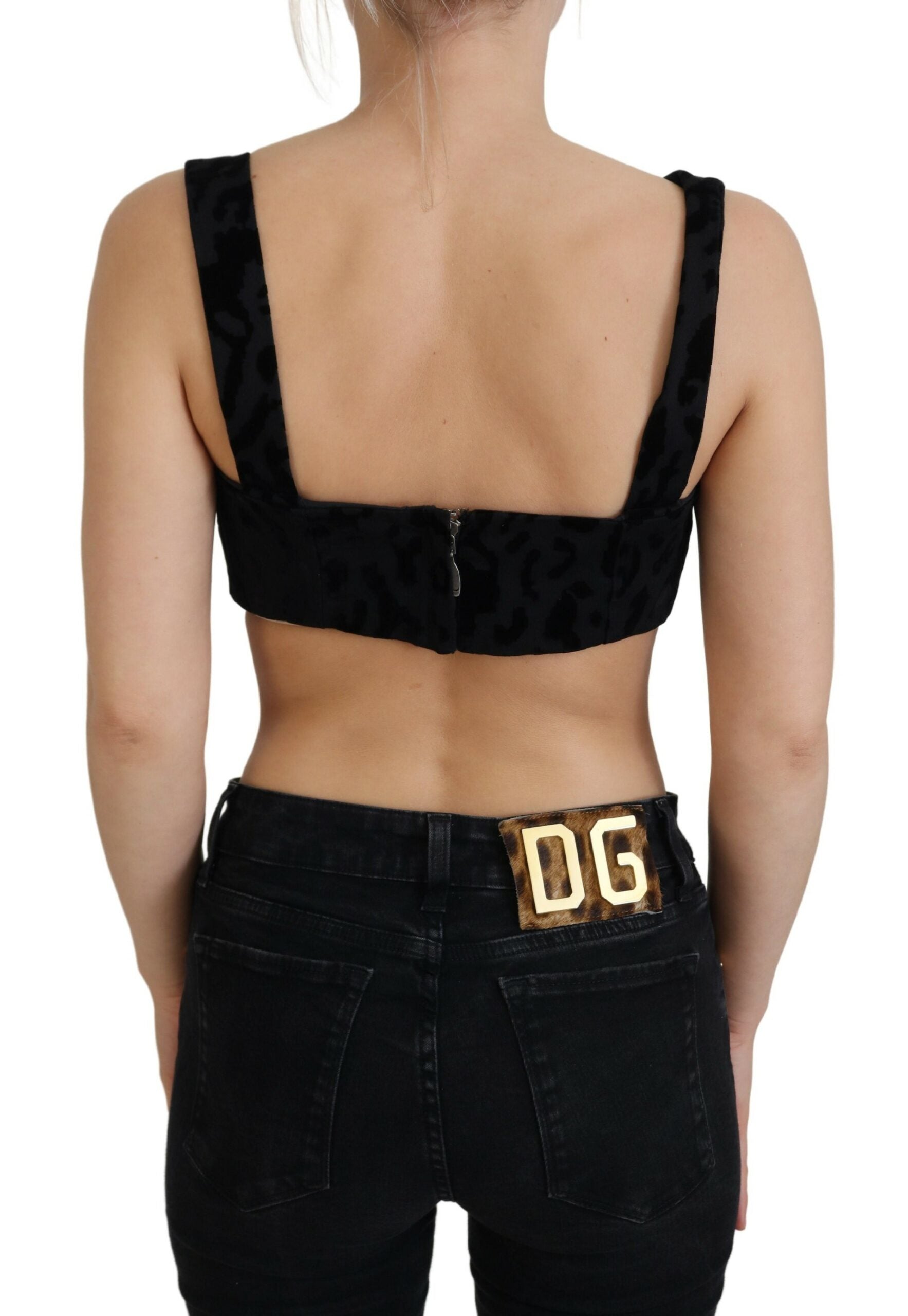 Black leopard print Dolce & Gabbana cropped bustier corset bra top with structured design and adjustable straps.
