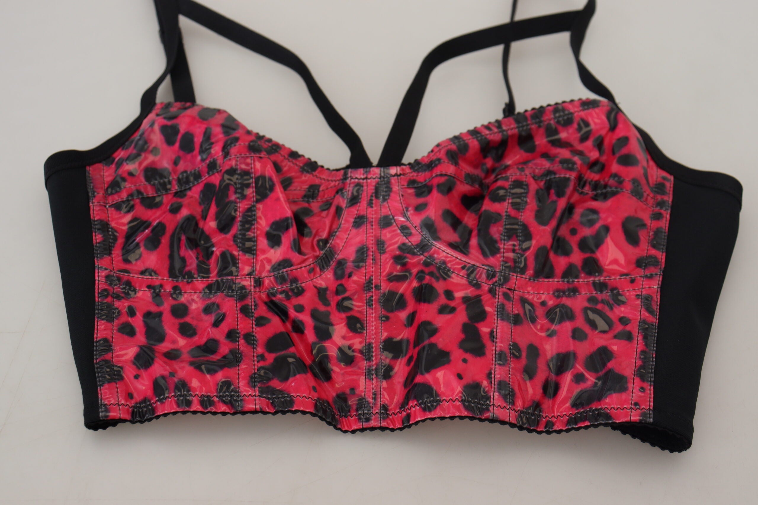 Pink leopard print cropped bustier corset top by Dolce & Gabbana, featuring a fitted design with bold animal print pattern.