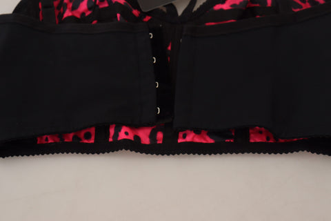 Pink leopard print cropped bustier corset top by Dolce & Gabbana, featuring a fitted design and bold animal print pattern.