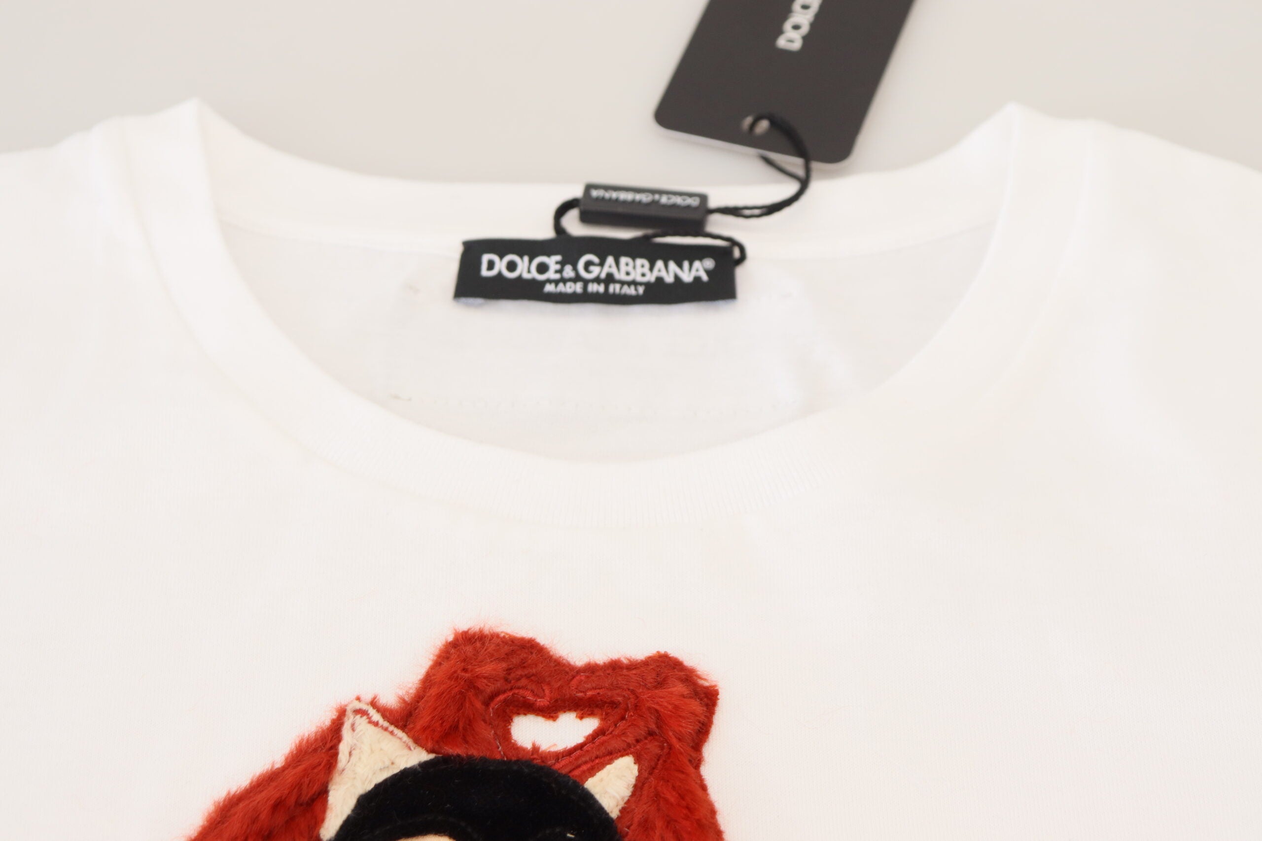 White textured short sleeve T-shirt top by Dolce & Gabbana with printed text on the front.