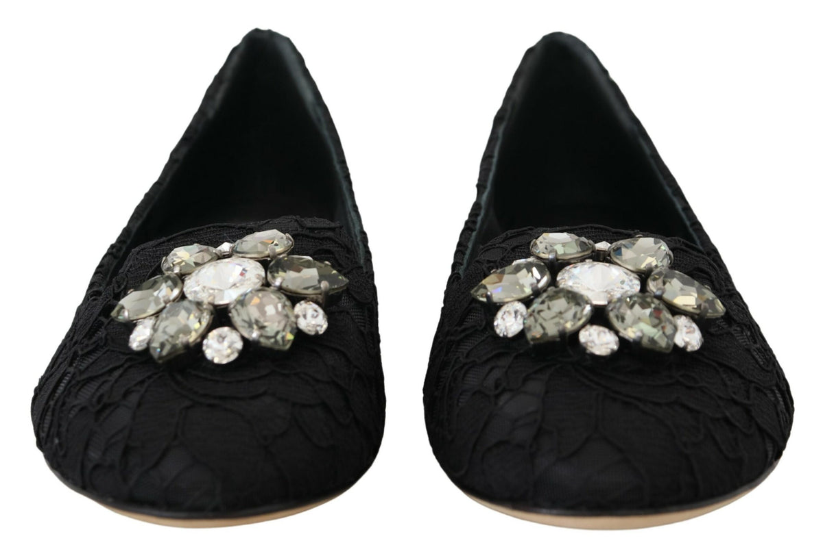 Black Taormina lace flats shoes with crystal embellishments by Dolce & Gabbana, featuring a elegant lace design and pointed toe.