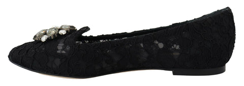 Black Taormina lace flats shoes with crystal embellishments by Dolce & Gabbana, featuring a sleek, elegant design and pointed toe.