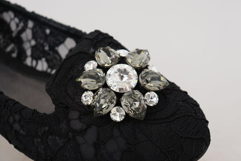 Black Taormina lace flats shoes with crystal embellishments by Dolce & Gabbana, featuring intricate lace details and elegant design.