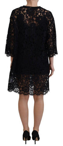 Black floral lace cotton shift mini dress by Dolce & Gabbana, featuring intricate lace details and a stylish, fitted silhouette.