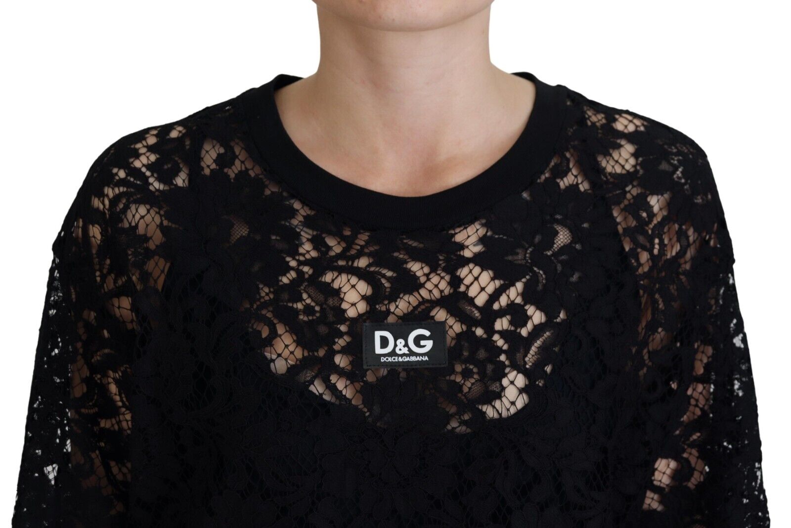 Black floral lace cotton shift mini dress by Dolce & Gabbana, featuring intricate lace details and a flattering fit.