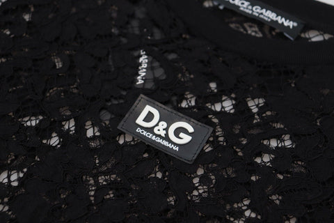 Black floral lace cotton shift mini dress by Dolce & Gabbana, featuring delicate lace details and a fitted silhouette.