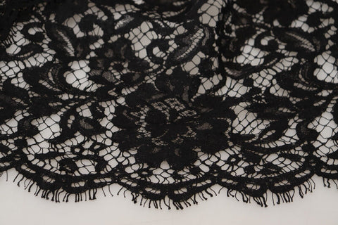 Black floral lace cotton shift mini dress by Dolce & Gabbana, featuring delicate lace details and a sleek silhouette.