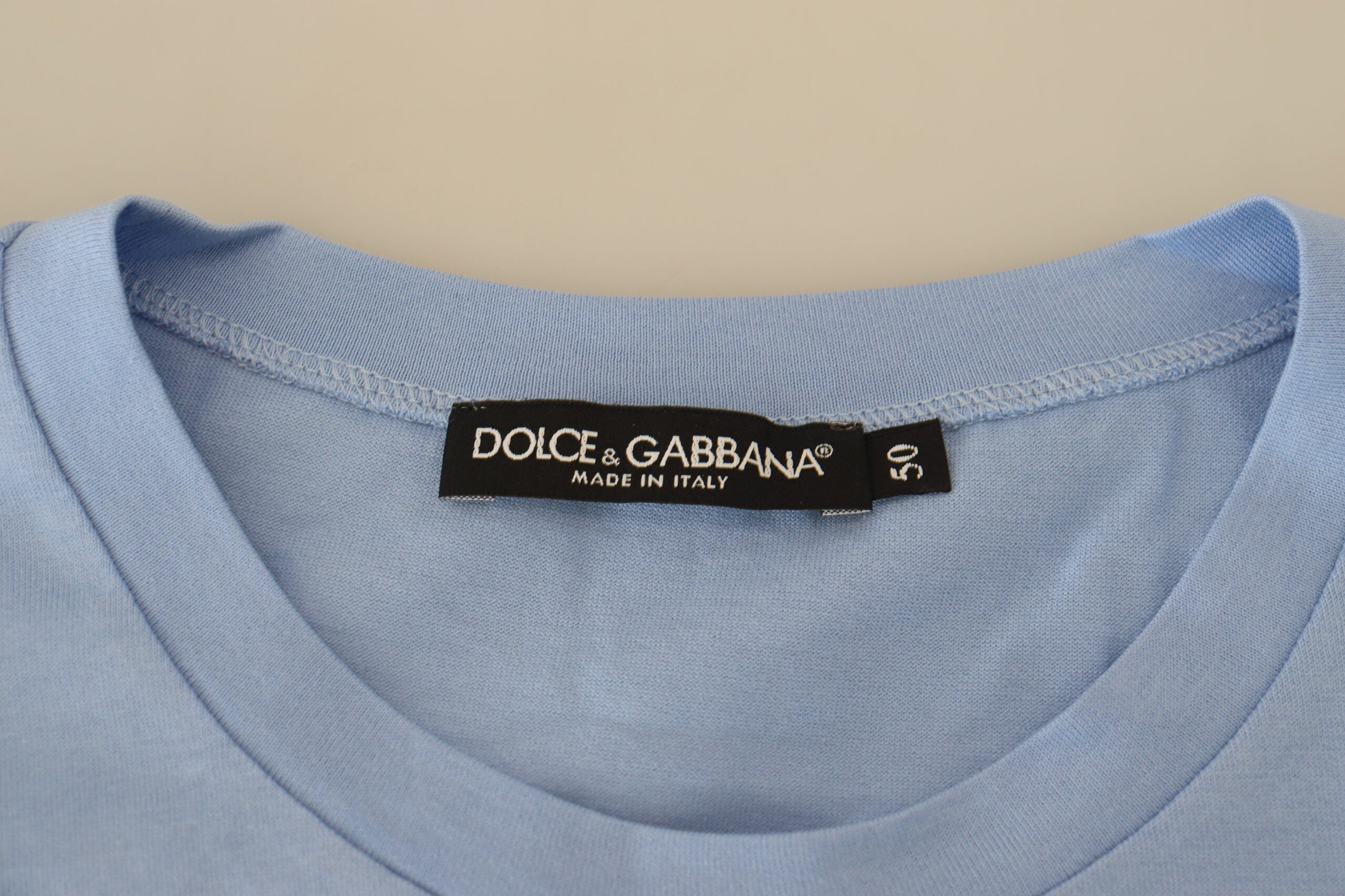 Light blue Dolce & Gabbana cotton T-shirt with Happy New Year 2017 print, casual style, front view.