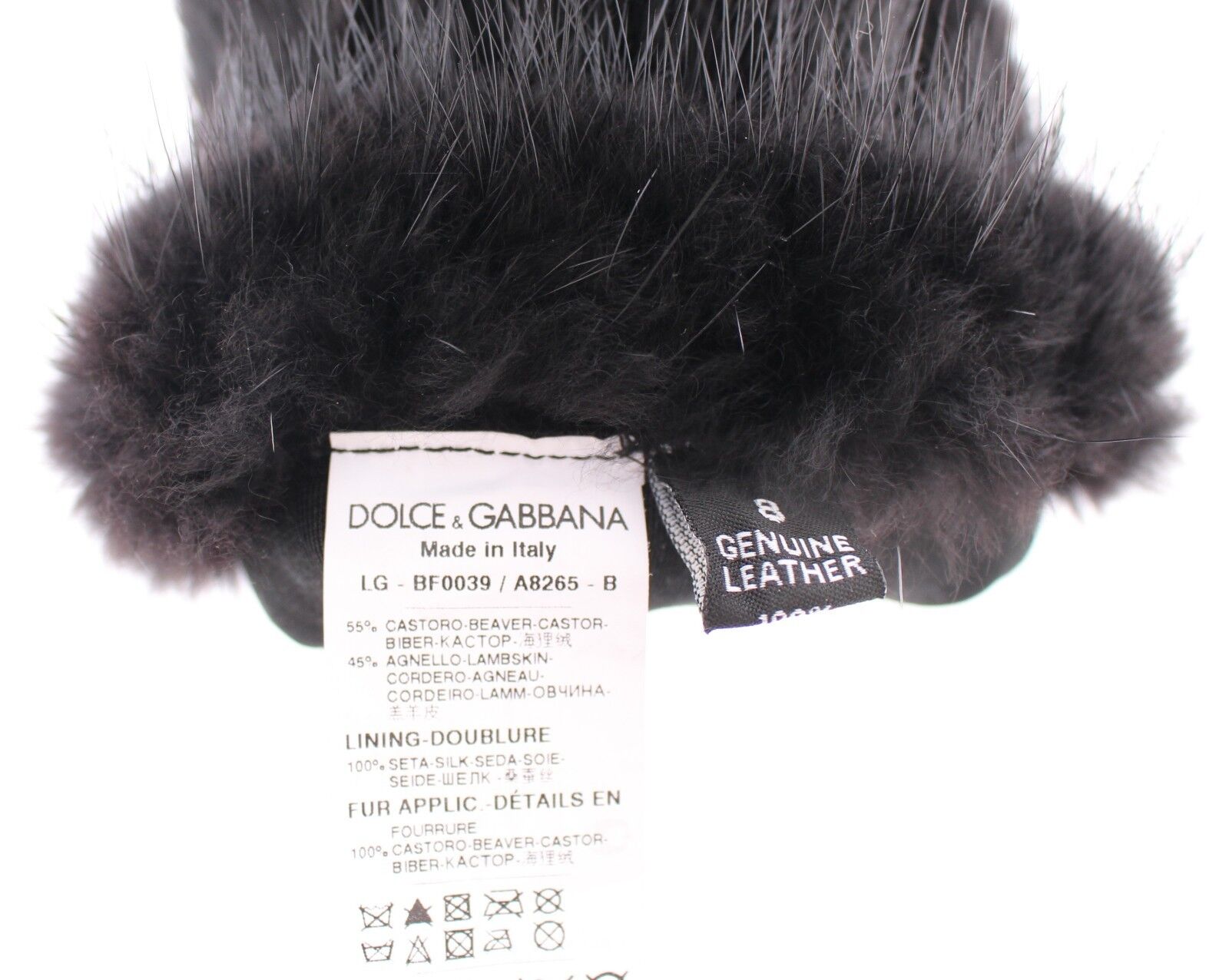 Black beaver fur and lambskin leather elbow gloves by Dolce & Gabbana with a sleek, stylish design and smooth finish.