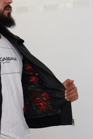 Black lamb leather men's coat with a collar, by Dolce & Gabbana, featuring a sleek design and tailored fit.