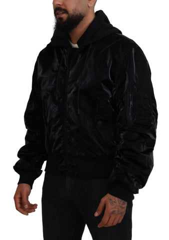Black nylon hooded full zip bomber jacket by Dolce & Gabbana, shown with front view and adjustable hood details.