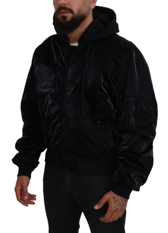Black nylon hooded full zip bomber jacket by Dolce & Gabbana, featuring a sleek design and hooded collar.
