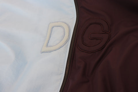 Black and blue Dolce & Gabbana hooded full-zip men's jacket with front pockets and stylish design.