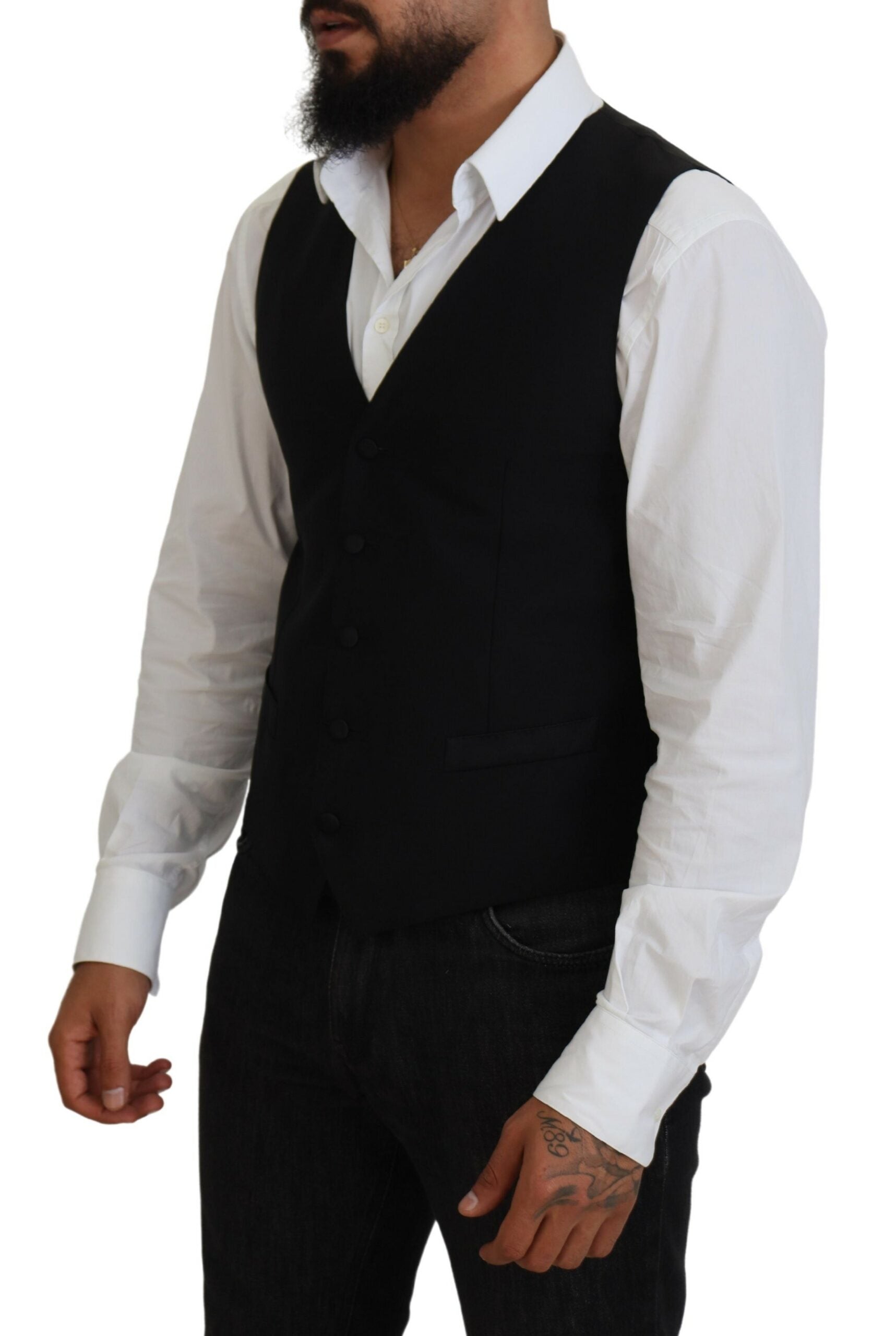 Black Virgin Wool Waistcoat by Dolce & Gabbana, formal vest with tailored fit and classic design, shown on a mannequin.