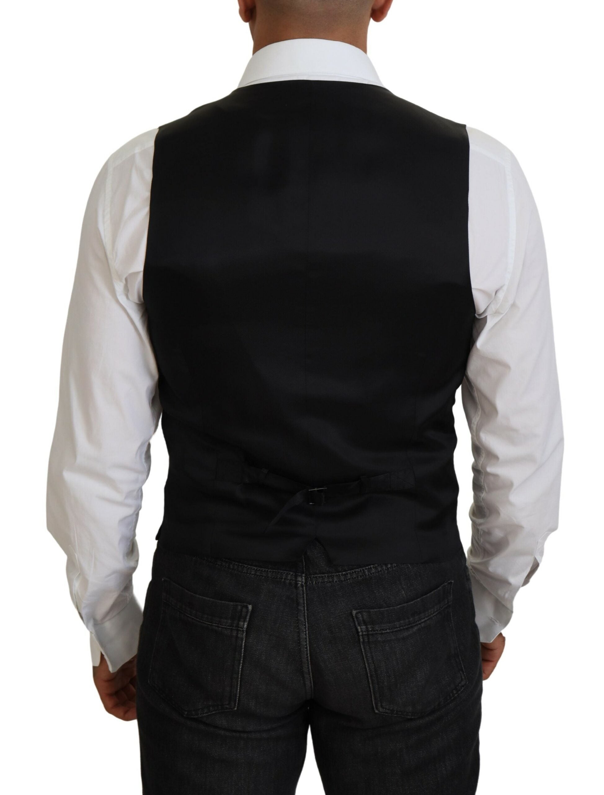 Black Virgin Wool Waistcoat by Dolce & Gabbana, formal vest with tailored fit and classic design, shown on a mannequin.