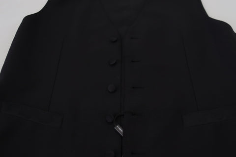 Black Virgin Wool Waistcoat Formal Vest by Dolce & Gabbana, tailored fit with lapel collar and button closure, suitable for elegant occasions.