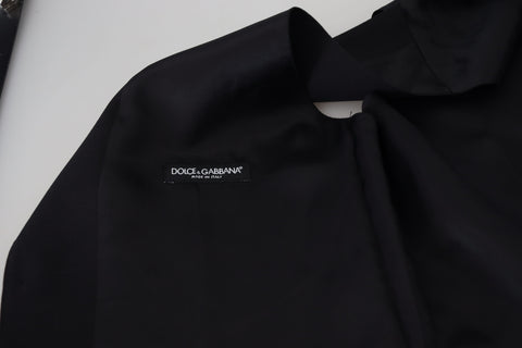 Black Virgin Wool Waistcoat by Dolce & Gabbana, formal vest with tailored fit, featuring classic lapels and sleek design.