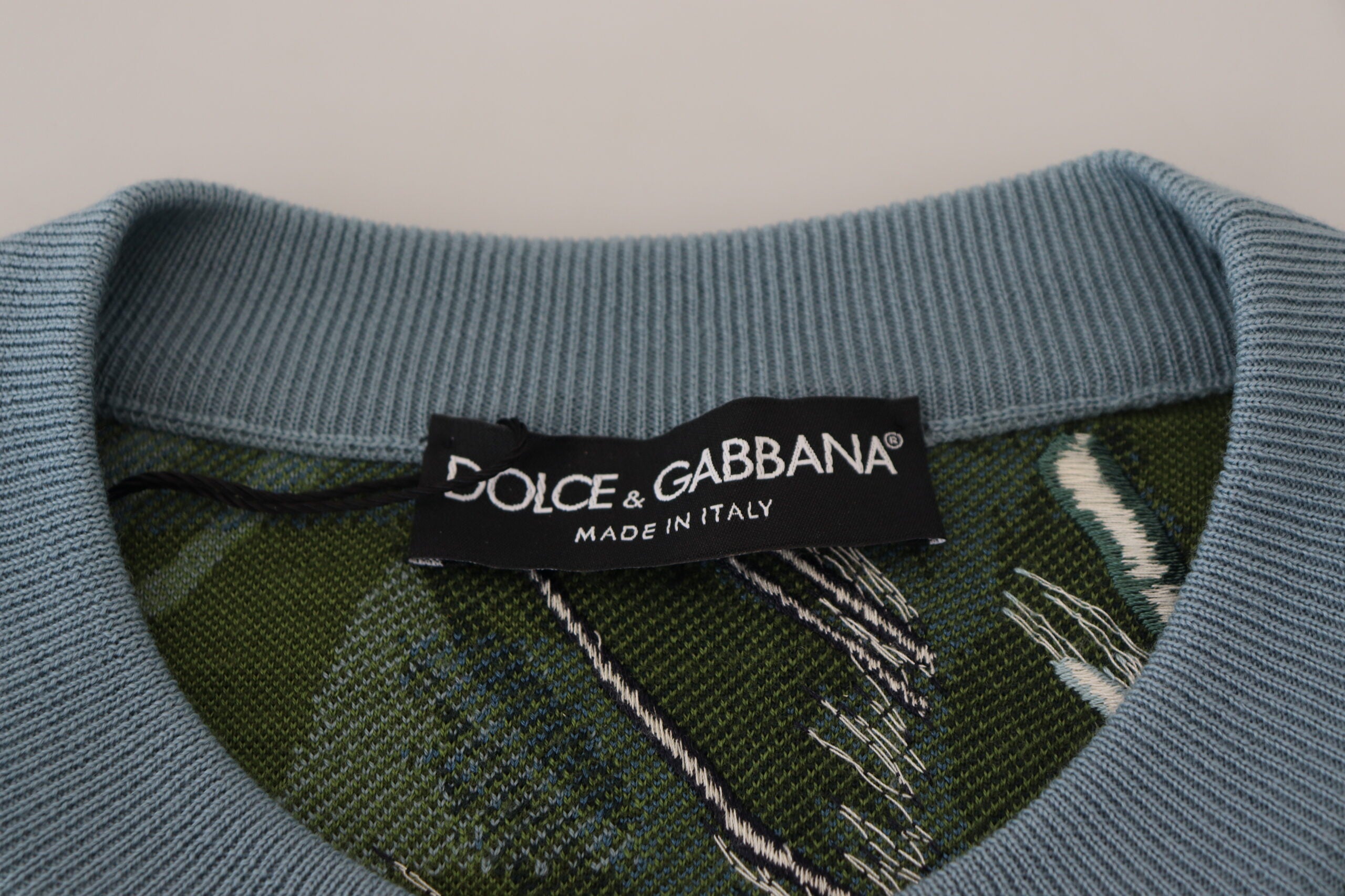 Multicolor jungle wool pullover sweater by Dolce & Gabbana featuring a logo design and vibrant jungle-inspired pattern.