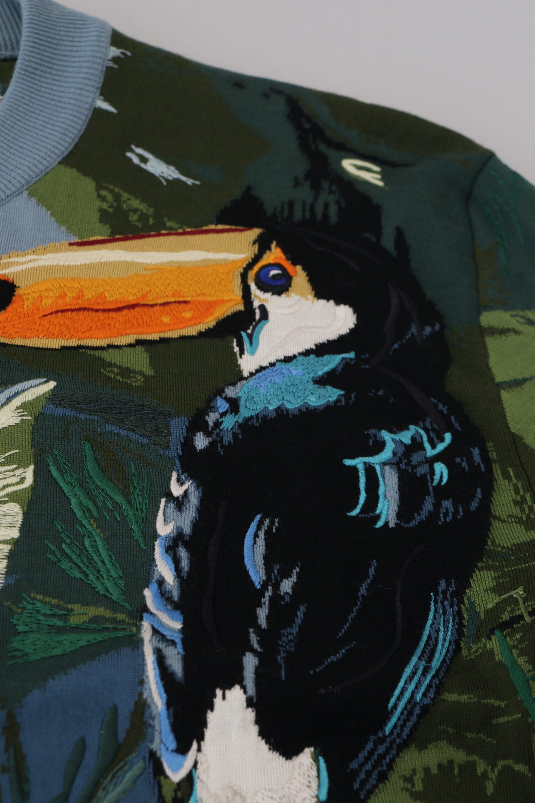 Multicolor jungle wool pullover sweater by Dolce & Gabbana featuring a logo design and vibrant jungle-inspired pattern.