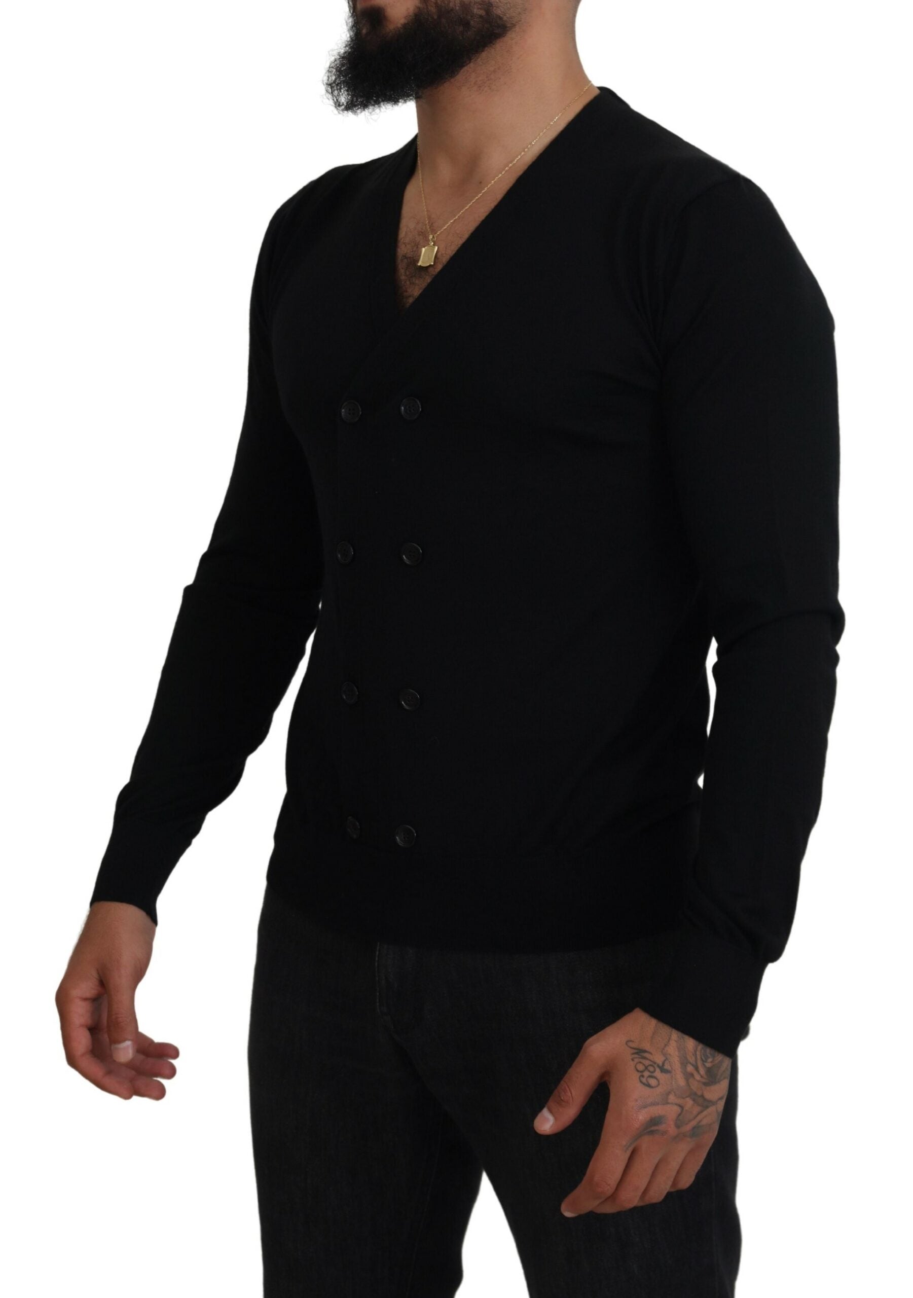 Black Dolce & Gabbana cashmere button-down cardigan sweater displayed on a hanger with a ribbed collar and cuffs.
